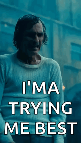 A Man In A White Sweater With The Words I 'M Trying Me Best On It GIF