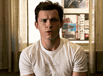 A Man In A White T-Shirt With A Milk Carton On It GIF