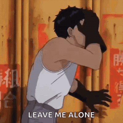 A Man In A White Tank Top And Black Gloves Is Covering His Face With His Hands And Says `` Leave Me Alone '' . GIF
