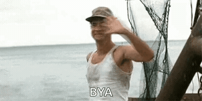 A Man In A White Tank Top And Hat Is Waving At The Camera While Standing On A Boat In The Ocean . GIF