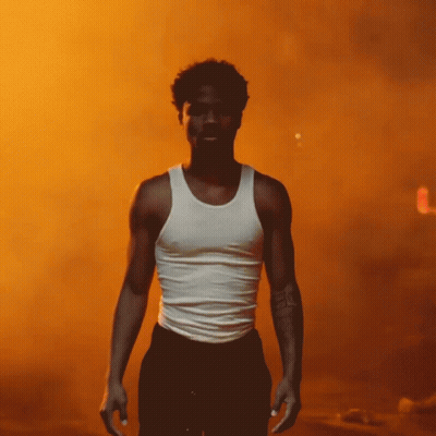 A Man In A White Tank Top Has A Tattoo On His Arm That Says ' I Love You ' GIF