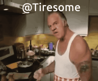A Man In A White Tank Top Is Cooking In A Kitchen And The Words @Tiresome Are Above Him GIF