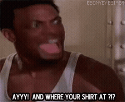 A Man In A White Tank Top Is Making A Funny Face And Saying `` And Where Your Shirt At ? '' . GIF