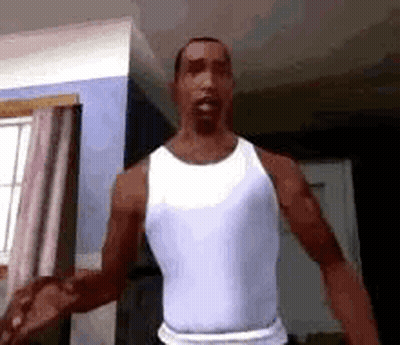 A Man In A White Tank Top Is Standing In A Living Room With His Arms Outstretched . GIF