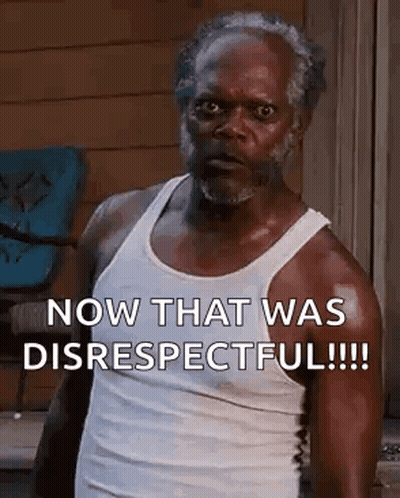 A Man In A White Tank Top Is Standing In Front Of A Window And Says `` Now That Was Disrespectful '' . GIF