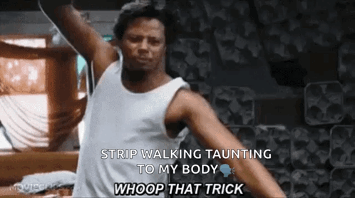 A Man In A White Tank Top Is Strip Walking Taunting To His Body . GIF
