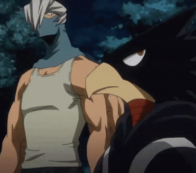 A Man In A White Tank Top Stands Next To A Black Bird With Red Eyes GIF