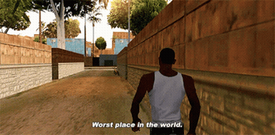 A Man In A White Tank Top Walks Down A Street With The Words Worst Place In The World Above Him GIF