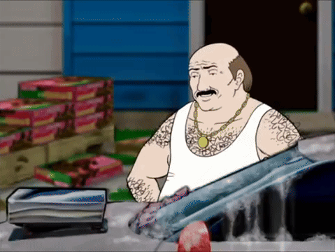 A Man In A White Tank Top With A Gold Chain Around His Neck Is Standing Next To A Car GIF