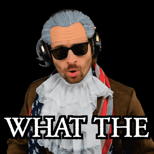A Man In A Wig And Sunglasses Is Wearing Headphones And Says What The GIF