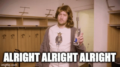 A Man In A Wig Is Holding A Bottle Of Vodka And The Caption Says Alright Alright Alright GIF