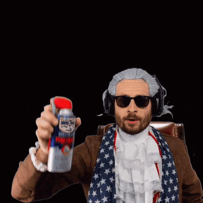 A Man In A Wig Is Holding Up A Can Of Penetrant GIF