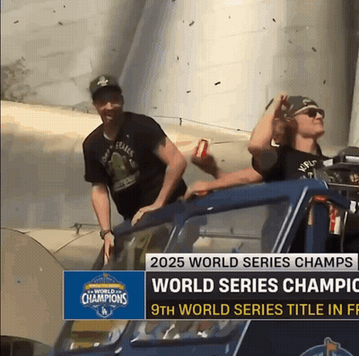 A Man In A World Series Champions Shirt Rides In A Car GIF