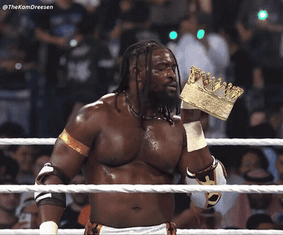 A Man In A Wrestling Ring With A Crown On His Head And A Caption That Says The Kamdreesen GIF