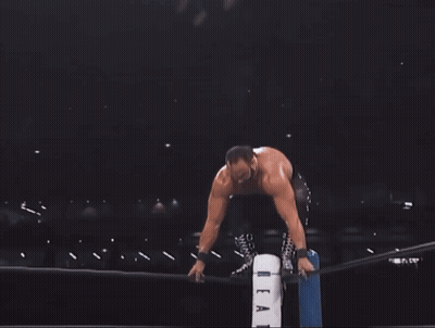A Man In A Wrestling Ring With A Lightning Bolt Coming Out Of His Chest GIF