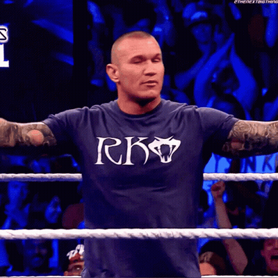 A Man In A Wrestling Ring With A Sign Behind Him That Says Mr. Miss Texas GIF