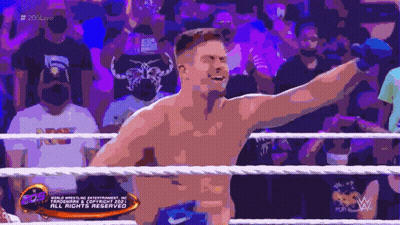 A Man In A Wrestling Ring With A Sign That Says All Rights Reserved On It GIF