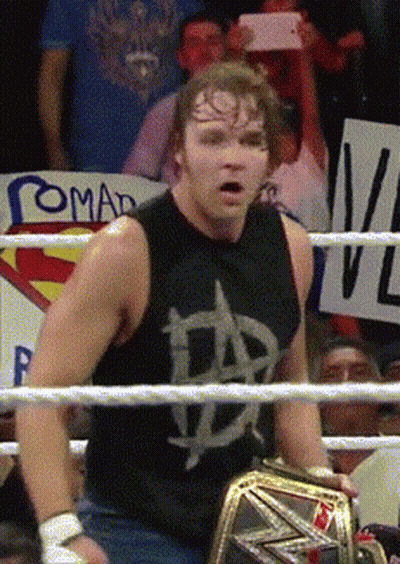 A Man In A Wrestling Ring With A Sign That Says Romad GIF