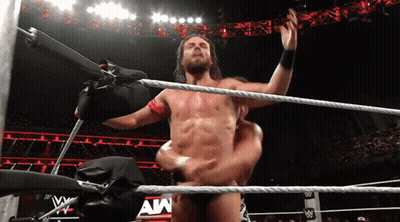 A Man In A Wrestling Ring With The Letters Aw On The Bottom GIF