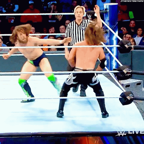 A Man In A Wrestling Ring With The Word Ethenextbigthing On The Bottom Right GIF
