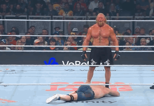 A Man In A Wrestling Ring With The Word Infinity On The Bottom GIF