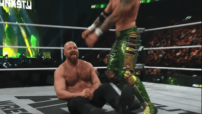 A Man In A Wrestling Ring With The Word Nasty On The Bottom GIF