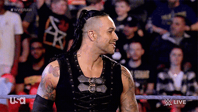 A Man In A Wrestling Ring With The Word Usa On The Bottom Right GIF