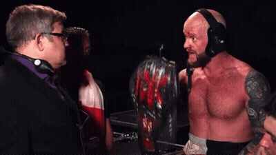 A Man In A Wrestling Ring With The Words I 'M The King Of The Mountain Around Here Below Him GIF