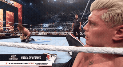 A Man In A Wrestling Ring With The Words Night Of The Champions On It GIF