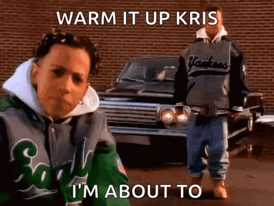 A Man In A Yankees Jacket Is Standing In Front Of A Car With The Words Warm It Up Kris I 'M About To GIF