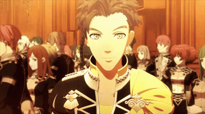 A Man In A Yellow And Black Uniform Is Standing In Front Of A Crowd Of People GIF