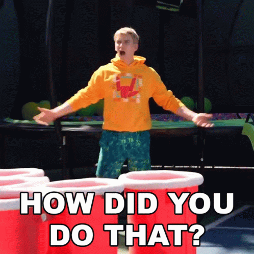 A Man In A Yellow Hoodie Is Standing In Front Of A Trampoline With The Words " How Did You Do That " Written Below Him GIF