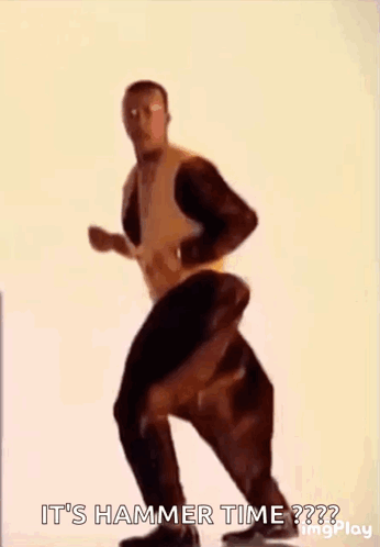 A Man In A Yellow Jacket And Black Pants Is Dancing And Says `` It 'S Hammer Time ? '' GIF