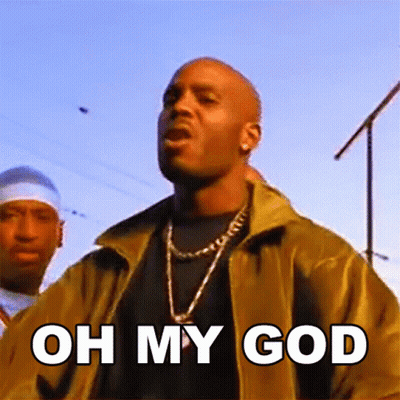 A Man In A Yellow Jacket Is Standing In Front Of A Sign That Says Oh My God GIF