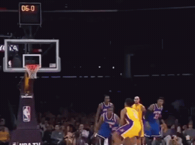 A Man In A Yellow Lakers Jersey Throws A Basketball GIF