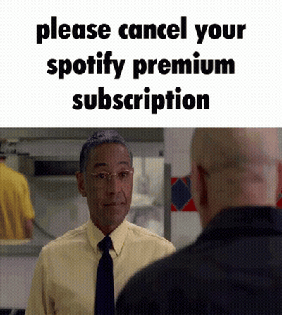 A Man In A Yellow Shirt And Tie Is Asking Another Man To Cancel His Spotify Premium Subscription .. GIF