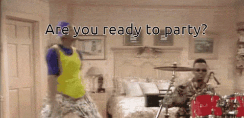 A Man In A Yellow Shirt Is Dancing In Front Of A Drum Set With The Words " Are You Ready To Party " Above Him GIF