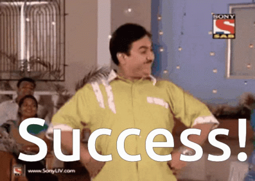 A Man In A Yellow Shirt Is Dancing In Front Of A Sign That Says " Success " GIF