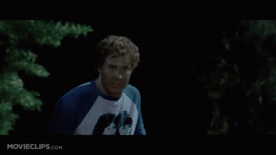 A Man In A Yellow Shirt Is Laying In The Dirt With Movieclips.com Written On The Bottom GIF