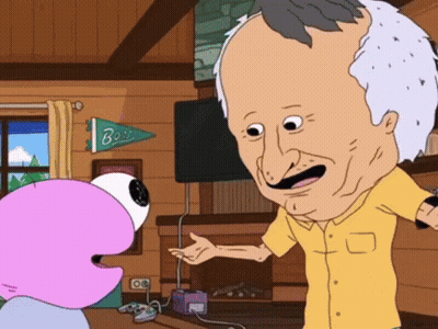 A Man In A Yellow Shirt Is Talking To A Cartoon Character In Front Of A Fireplace With A Banner That Says Boss GIF