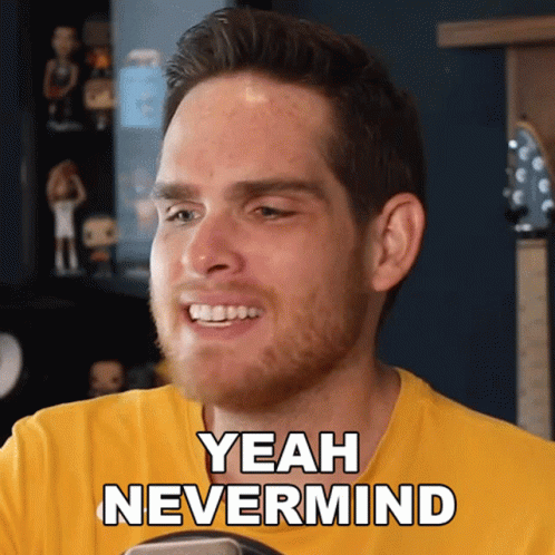 A Man In A Yellow Shirt Says " Yeah Nevermind " On His Face GIF