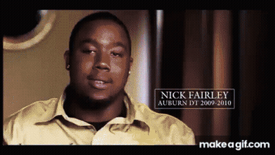 A Man In A Yellow Shirt With The Name Nick Fairley GIF