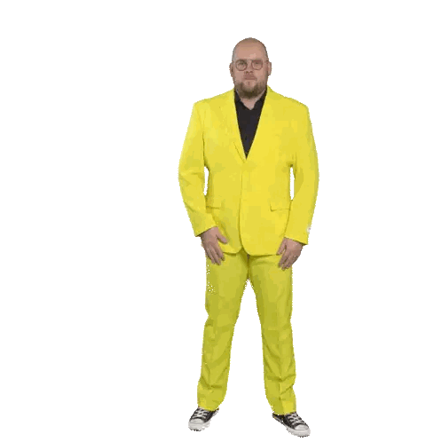 A Man In A Yellow Suit And Black Shirt Is Standing With His Hand On His Chest Sticker