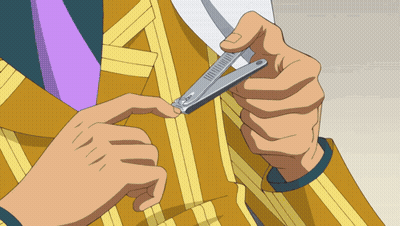 A Man In A Yellow Suit Is Cutting His Nails With A Pair Of Nail Clippers GIF
