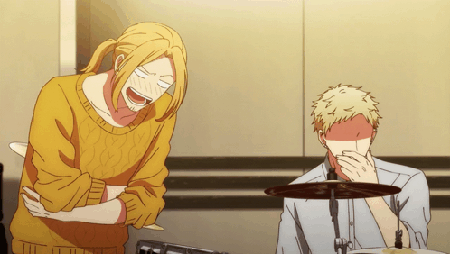 A Man In A Yellow Sweater Is Laughing Next To Another Man In A White Shirt GIF