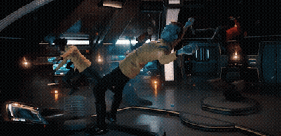 A Man In A Yellow Uniform Has A Badge On His Chest That Says " Captain " GIF