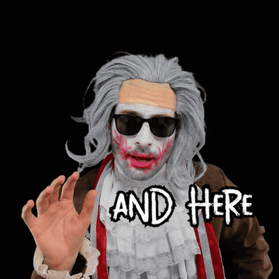 A Man In A Zombie Costume Says " And Here " With His Hand Outstretched GIF