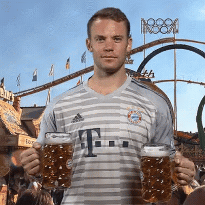 A Man In An Adidas Shirt Holds Two Beer Mugs GIF