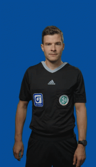A Man In An Adidas Shirt Is Holding Up A Red Card GIF