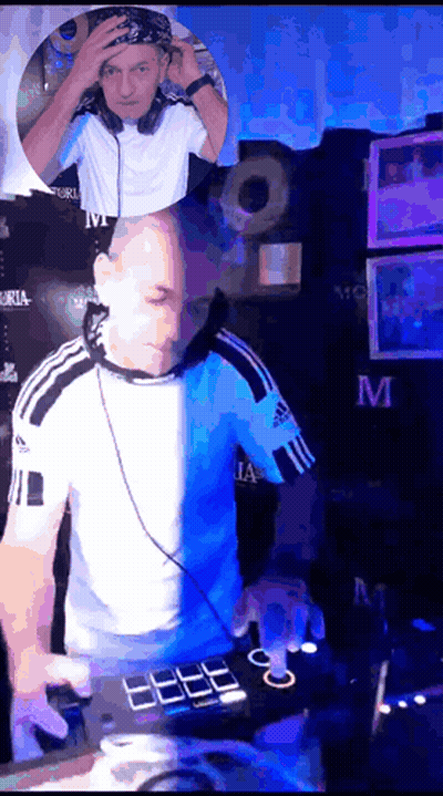 A Man In An Adidas Shirt Is Playing Music On A Mixer GIF